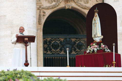 Pope Francis places the world under the protection of Our Lady of Fatima, Saturday, October 12, 2013.