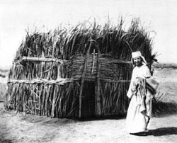 Father de Foucauld in front of his first hut in Tamanrasset.