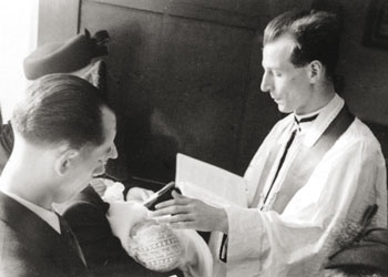 The Abbé de Nantes baptizes a child