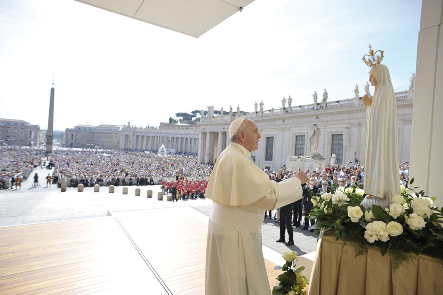 In 2015, in Saint Peter’s Square, Pope Francis praying before the statue of Our Lady of Fatima. 